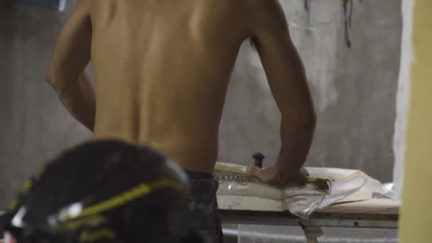 Young Male Working Workshop Making Skateboards — Stock video