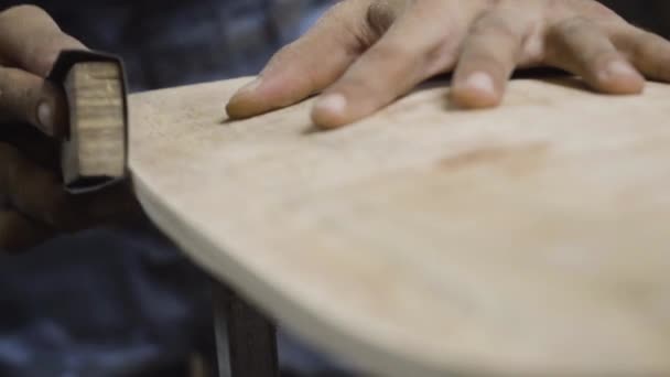 Craftsman Sanding Skateboard Make Smooth Silk Close View — Stockvideo