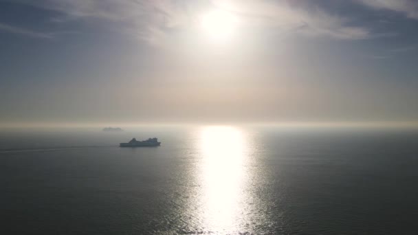 Silhouette Cruise Ship Navigating Silver Sea Water Aerial Forward — Stockvideo