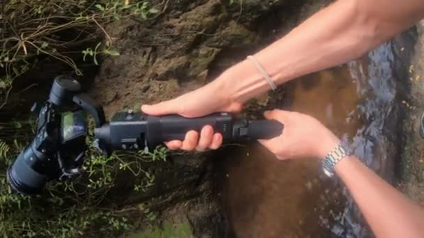 Vertical Video Pov Camera Man Operating Gimbal Outdoors Waterfall — Video Stock