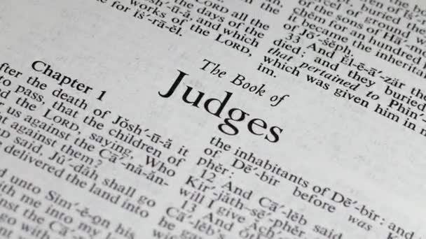 Close Shot Bible Turning Book Judges — 图库视频影像