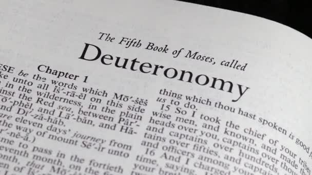 Close Shot Bible Turning Book Deuteronomy — Vídeos de Stock