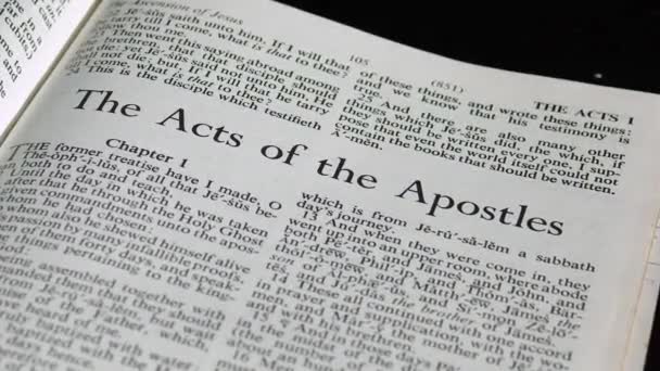 Close Bible Page Turning Book Acts — Video Stock