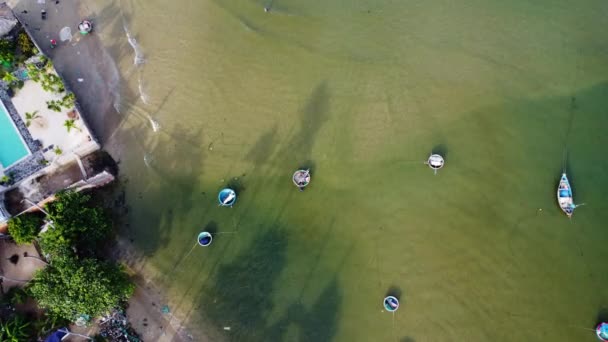 Aerial Bottom View Small Beach Green Water Boats Slow Motion — Stockvideo
