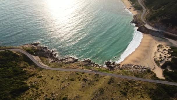 Coastal Landscape Beach Road Sun Rays Reflecting Sea Aerial Circling — 图库视频影像