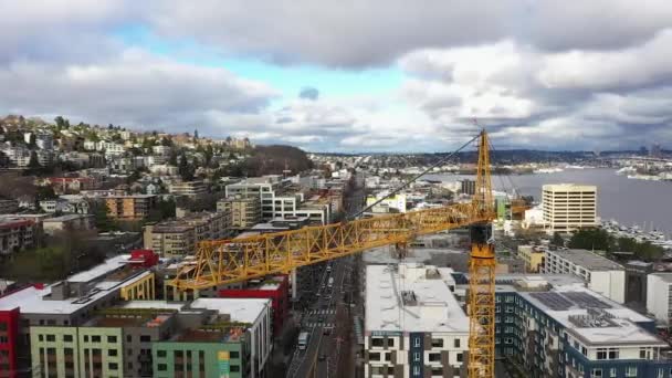 Orbiting Aerial Crane Used Construction Seattle Lake Union — Stockvideo