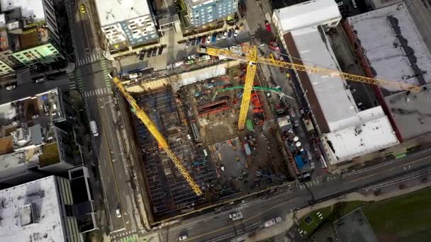 Rotating Aerial Construction Cranes Sitting Empty Lot — Stock videók