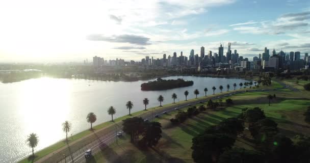 Smooth Aerial Approach Melbourne Cbd While Traffic Leaves City Area — Vídeos de Stock