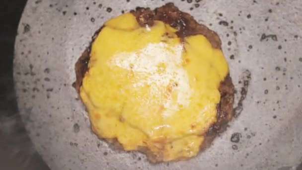 Creamy Cheese Melted Beef Patty While Cooking Overhead — Video