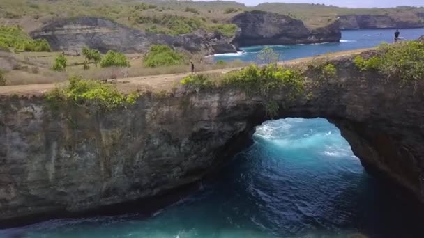 Smooth Aerial View Flight Fly Forwards Hole Rock Drone Shot — Stockvideo