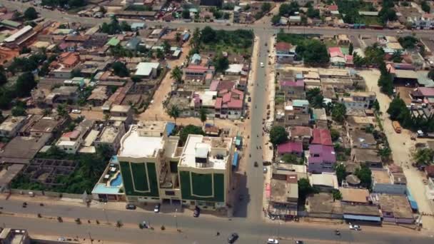 Cinematic Aerial View African City Traffic Showing Twin Towers Building — Vídeos de Stock