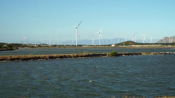 Static Low Pov Wind Turbines Blue Sky River Foreground Vietnam — Video Stock