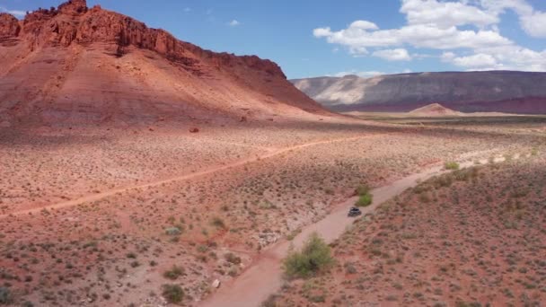 Aerial Dune Buggy Riding Desert Terrain — Vídeos de Stock