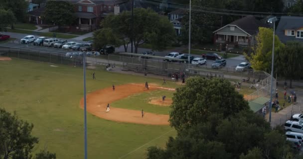 Drone View Little League Baseball Game Night — стоковое видео