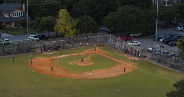Drone View Little League Baseball Game Night — стоковое видео