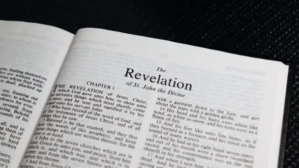 Close Shot Bible Page Turning Book Revelation — Vídeo de Stock