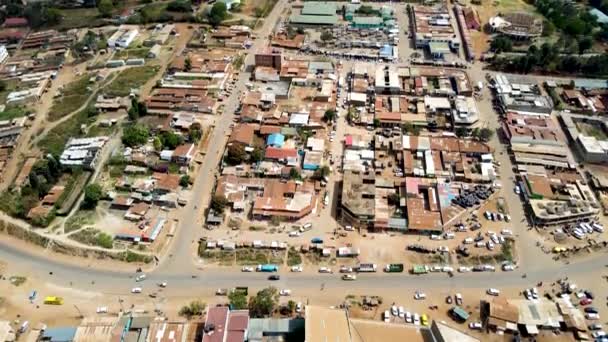 Aerial Flyover Poor Kibera Slum Modern Skyline Nairobi Background Sunny — Stock Video