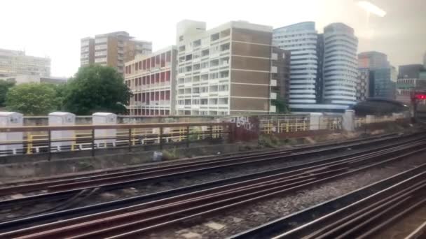 Looking Out Window Train Railway Tracks City — Vídeos de Stock