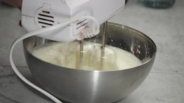 Baker Whisks Cheesecake Filling Metal Bowl Hand Mixer Closeup — Stok video