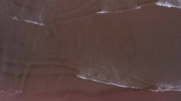 Top Drone View Waves Ocean Water Approaching Sandy Beach — Video Stock