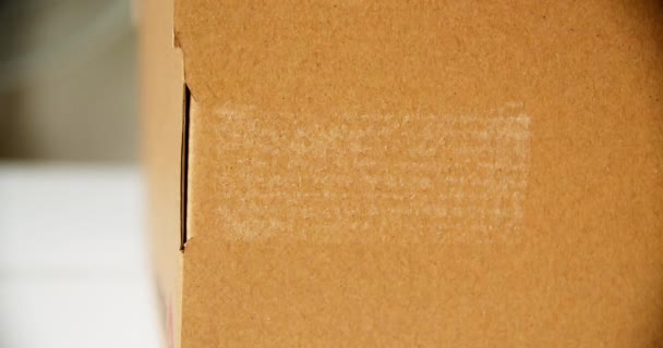 Hands Applying Made Flag Label Shipping Cardboard Box Products Close — стокове відео