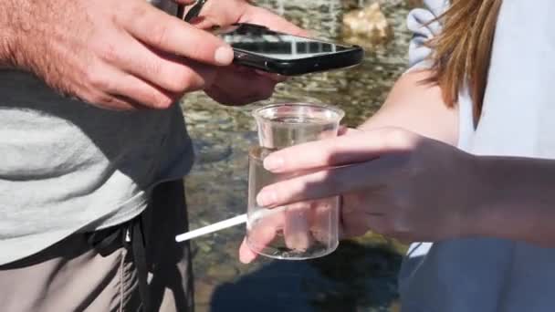 Marine Scientist Conducting Field Research Taking Photos Animals Specimen Jar — стоковое видео