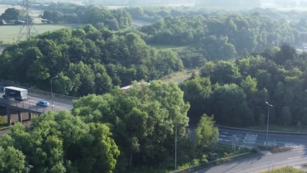 Aerial View British Woodland Countryside Vehicles Travelling Highway Background — 图库视频影像