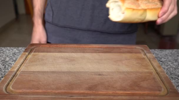Guy Put Show Cuban Bread Wooden Chopping Board Close — ストック動画