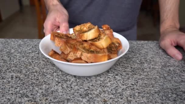 Man Serving Slices Freshly Toast Flavored Bread Close — Vídeo de stock