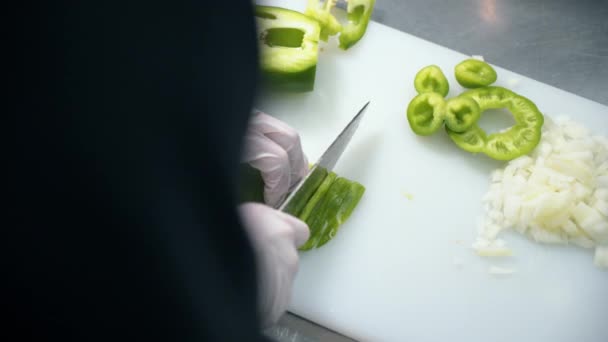 Chef Thinly Slices Green Bell Pepper Cutting Board Slow Motion — Stock Video