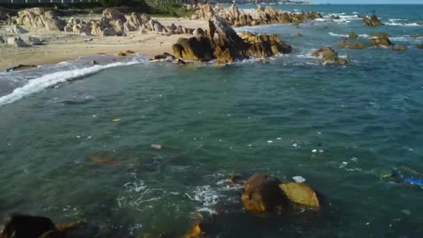 Littered Garbage Floating Ocean Shore Rubbish Beach Vietnam Drone Shot — Stockvideo