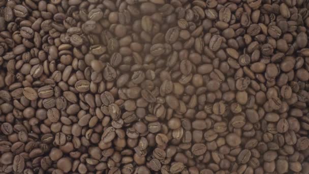 Dropping Many Coffee Beans Others Already Covering Floor Overhead Closeup — Stok Video