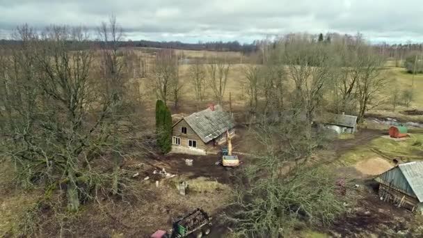 Aerial Backward Moving Shot Yellow Jcb Leveling Landscape Residential Construction — Stock Video