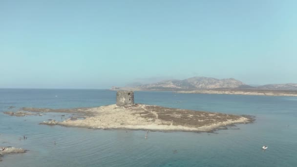 Old Tower Pelosa Beach Surrounded Blue Waters Sunny Day — Stockvideo
