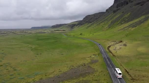 Tour Bus Driving Mountains Iceland Drone Video — Stockvideo