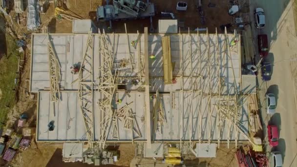 Aerial View Workers Working Construction Site Wooden Trusses Building Tilt — Video Stock