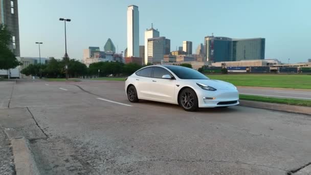 American Made Tesla Model Dallas Texas Skyline Slow Aerial Orbit — стокове відео