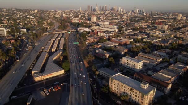 Aerial Drone Shot Los Angeles Freeway Skyline Traffic Summer Sunset — Stock video