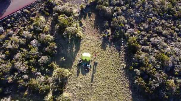 Top Drone Footage Tent Man Mountain Road Some Cars — Vídeos de Stock
