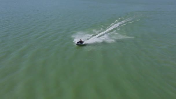 Aerial Drone View One Person Riding Speeding Jet Ski Sea — 비디오