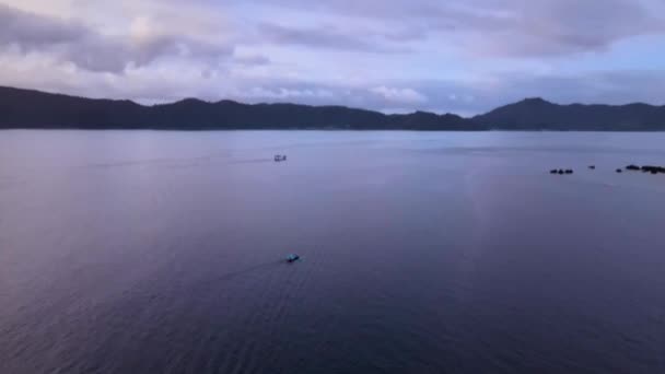 Purple Sunset Calm Sea Fishing Boat Aerial Drone Push Tilt — Stockvideo