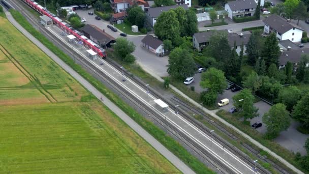 Drone Tracks Commuter Train Rural Stop Munich Aerial View Flying — Vídeo de Stock