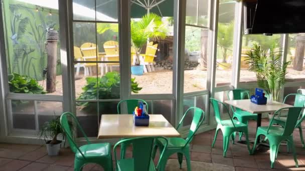 Restaurant Tables Chairs Patio Indoor Outdoor Seating Guests Tropical Theme — Video Stock