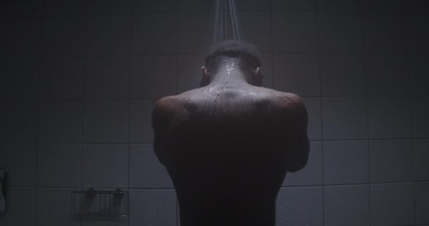 Young Black Athlete Taking Warm Shower — Vídeos de Stock