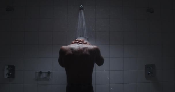 Young Black Male Taking Warm Shower Workout Gym — Αρχείο Βίντεο