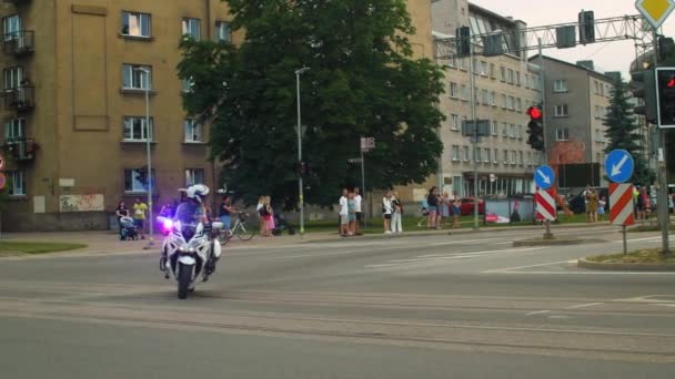Latvian Road Police Officer Motorbike Blue Red Flashing Lights Monitoring — Wideo stockowe
