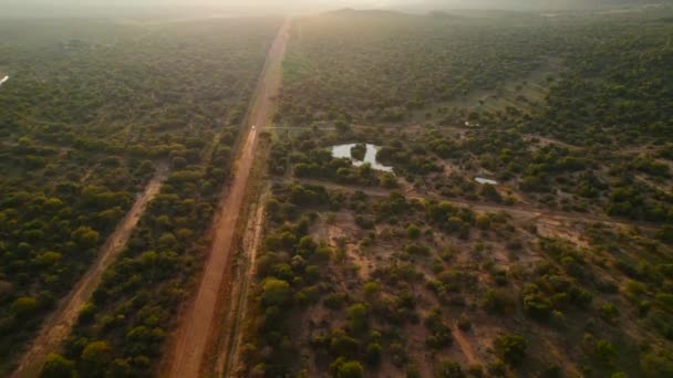 Offroad Car Drives Raises Dust Road Remote Landscape Dusk Aerial — Video
