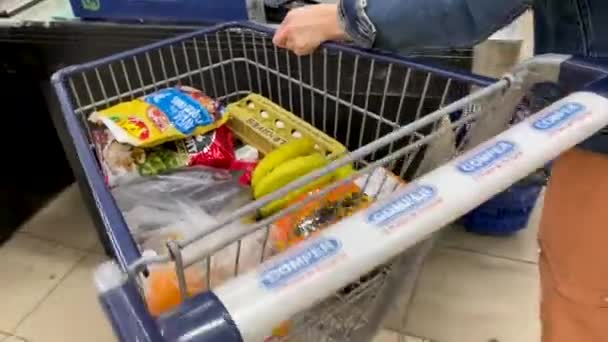 Close Shot Shopping Trolley Big Supermarket Going Cash Register Waiting — Stockvideo