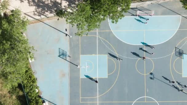 Locals Playing Basketball Blue Outdoor Court Hot Daylight Top Aerial — Vídeo de Stock