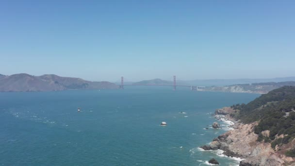 Aerial Wide Shot Golden Gate Bridge Pacific Ocean Side Land — Stock videók